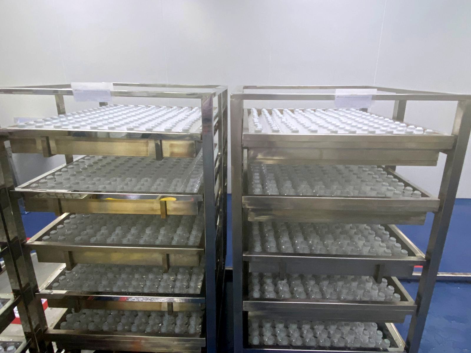 Filled vials in racks awaiting release